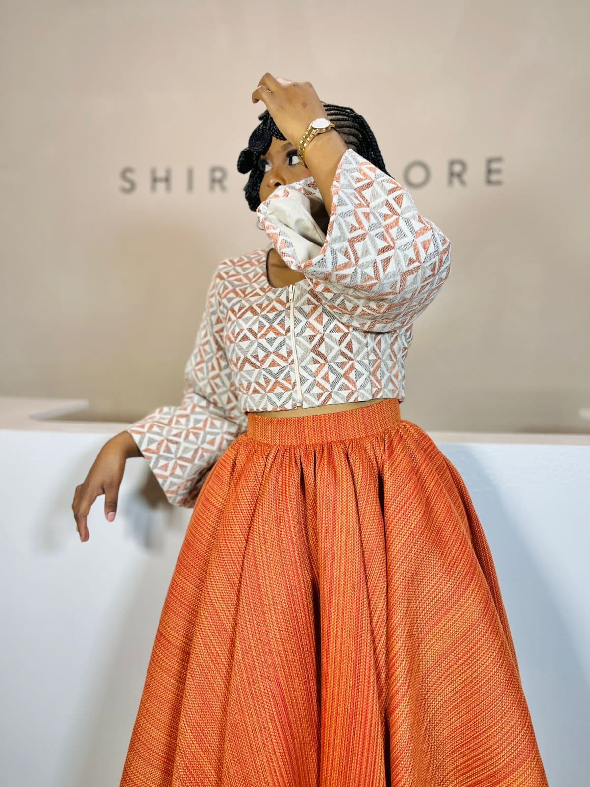 Geometric Jacket & Burnt Orange Skirt